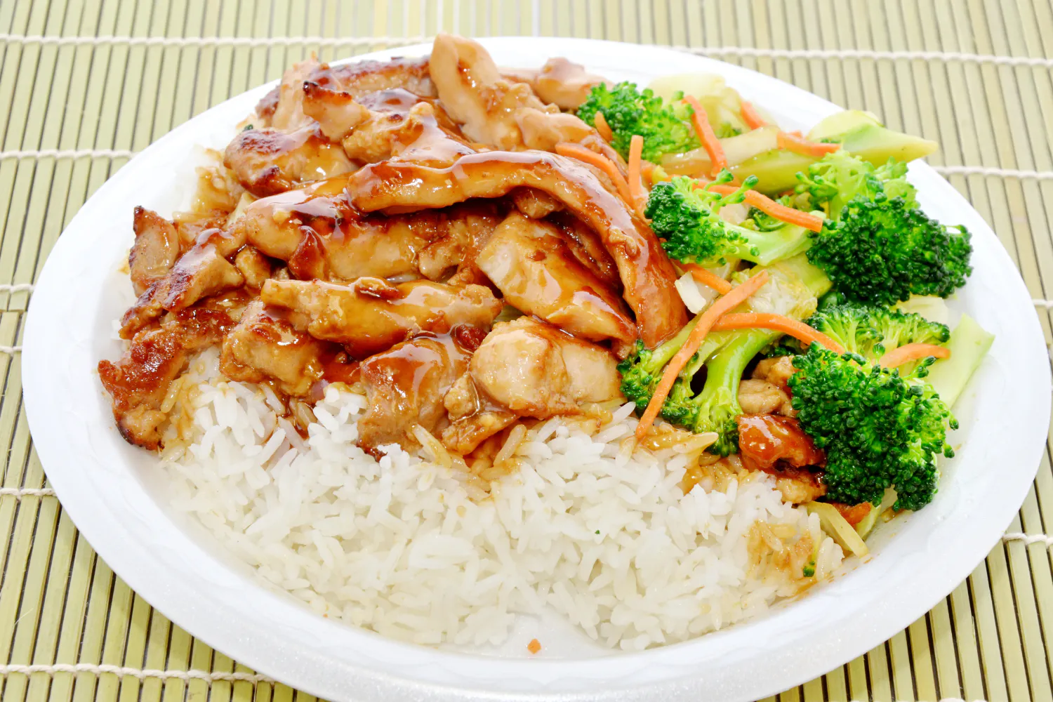 Chicken teriyaki with steamed rice and broccoli carrot mix at Fusan Dumpling House & Sushi, an Asian Fusion Restaurant in New York