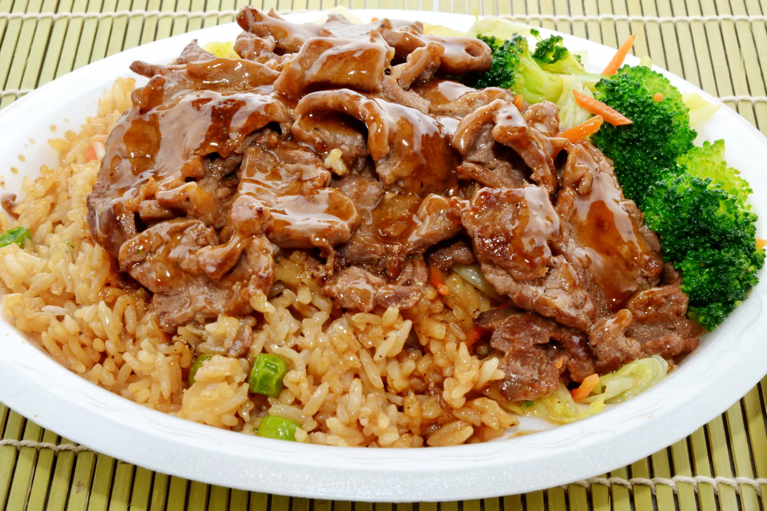 Beef teriyaki with fried rice and mixed vegetables at Fusan Dumpling House & Sushi, an Asian Fusion Restaurant in New York