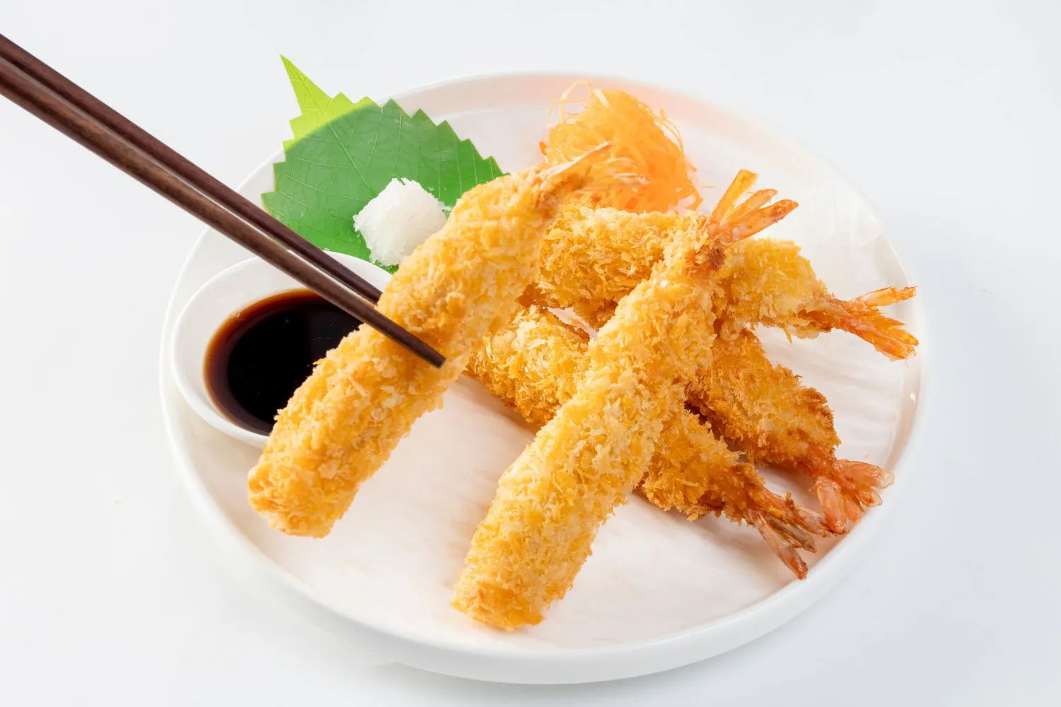 Crispy fried tempura shrimp served with soy dipping sauce at Fusan Dumpling House & Sushi, an Asian Fusion Restaurant in New York
